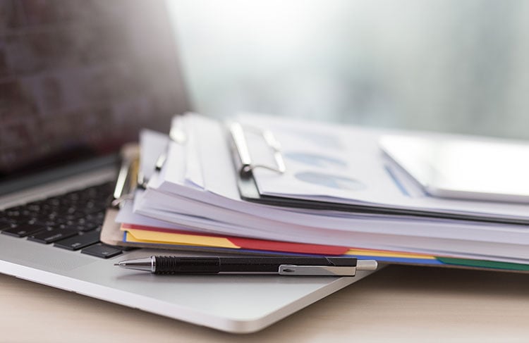 bigstock-Businessman-Working-Reading-Do-750px